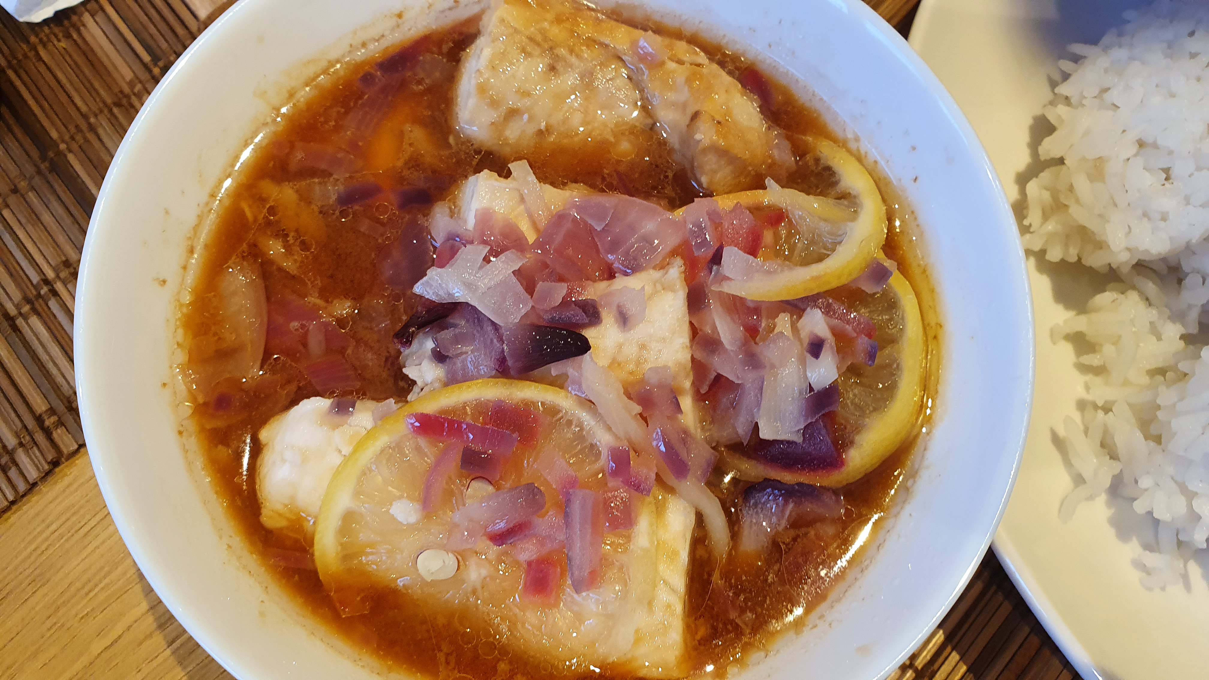 steamed fish with lemon and onion